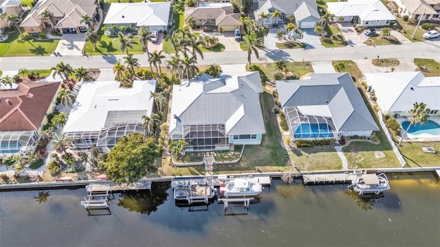 bird's eye view with a water view