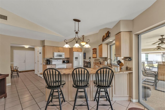 kitchen with light brown cabinetry, white appliances, hanging light fixtures, kitchen peninsula, and ceiling fan