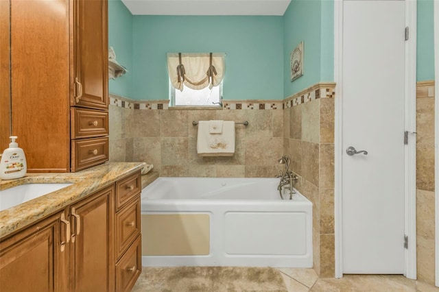 bathroom with a tub to relax in, tile walls, and vanity