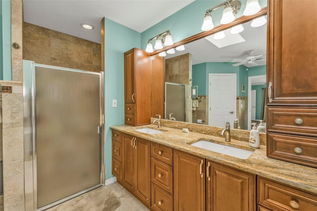 bathroom featuring walk in shower, ceiling fan, and vanity