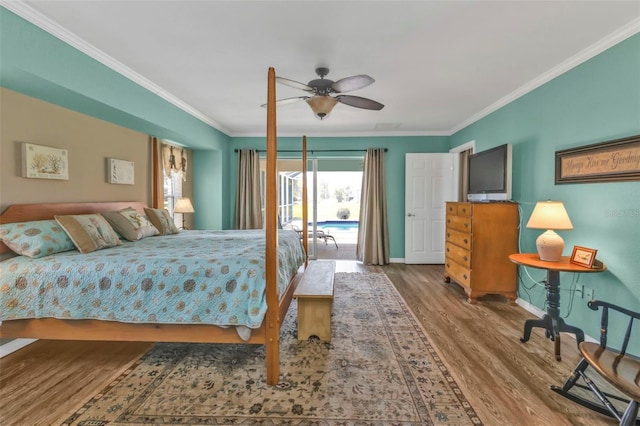 bedroom featuring ornamental molding, hardwood / wood-style floors, and ceiling fan