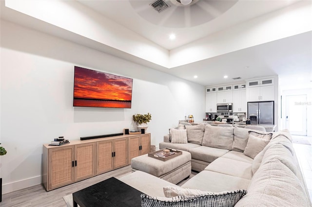2709 Magdalina Dr Unit 101 102B, Punta Gorda, FL 33950 - living area with visible vents, baseboards, ceiling fan, light wood-style floors, and recessed lighting