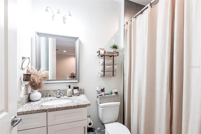2709 Magdalina Dr Unit 101 102B, Punta Gorda, FL 33950 - full bath with a shower with shower curtain, vanity, and toilet