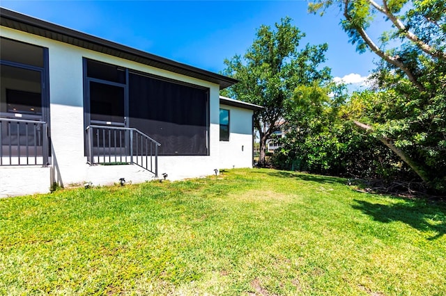 2709 Magdalina Dr Unit 101 102B, Punta Gorda, FL 33950 - view of yard with a sunroom