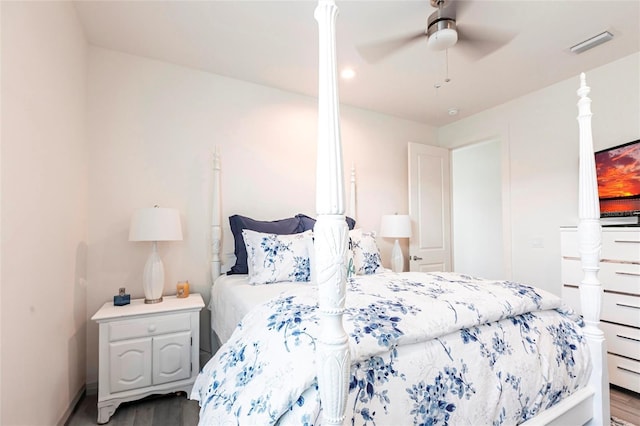 2709 Magdalina Dr Unit 101 102B, Punta Gorda, FL 33950 - bedroom with wood finished floors, baseboards, a ceiling fan, and visible vents