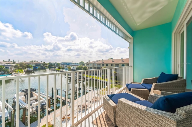 balcony featuring a water view