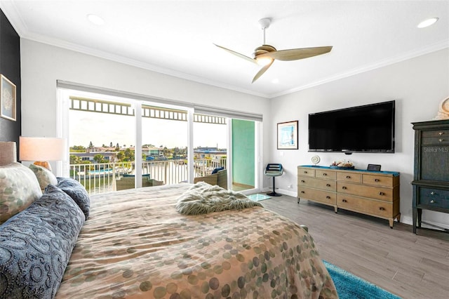 bedroom featuring hardwood / wood-style flooring, crown molding, access to outside, and ceiling fan