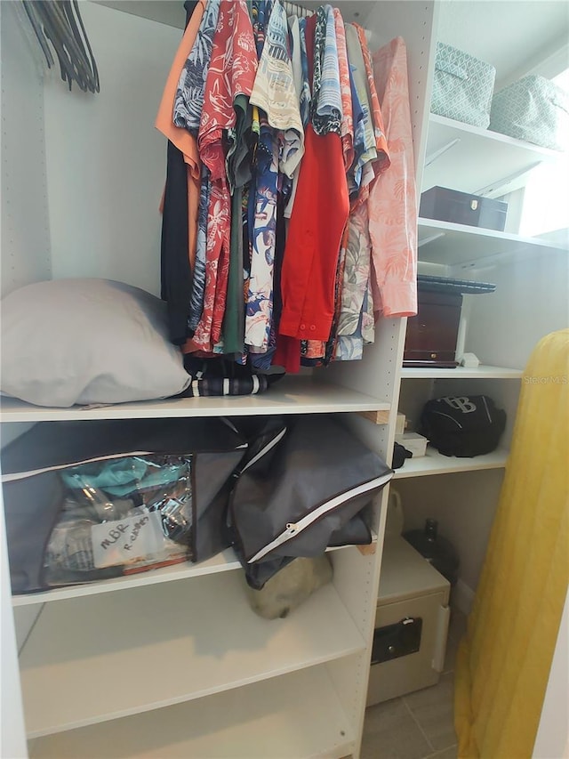 spacious closet with tile patterned flooring