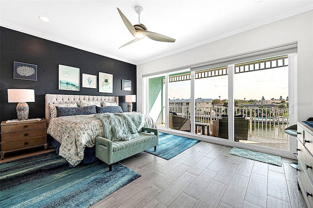 bedroom featuring crown molding, access to outside, wood finished floors, and ceiling fan