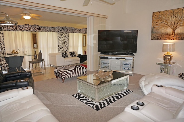 living room with ceiling fan and carpet floors