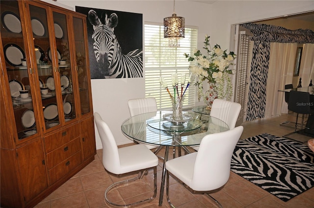 dining space with light tile patterned floors