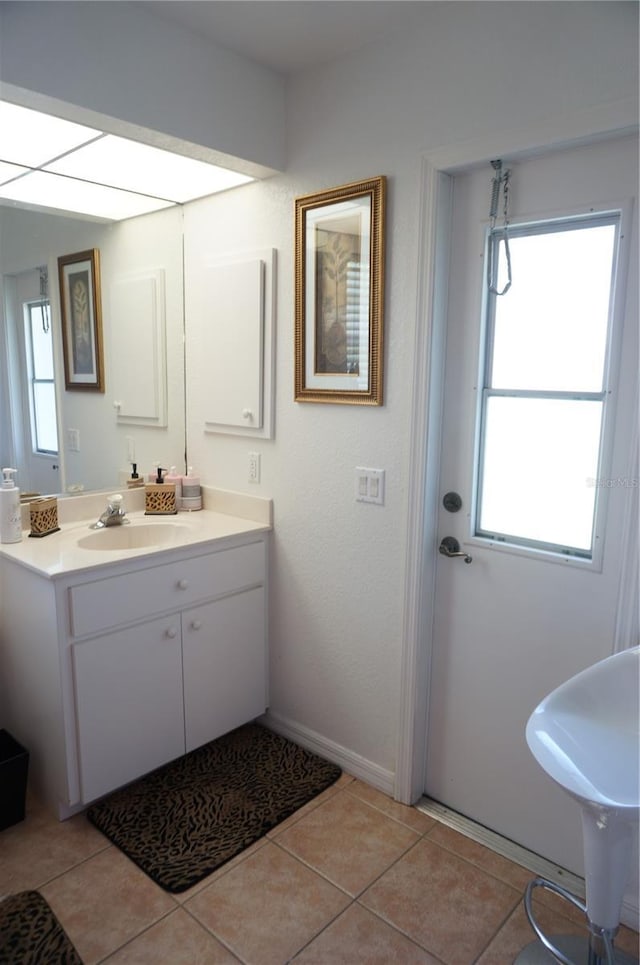 bathroom featuring vanity and tile patterned flooring