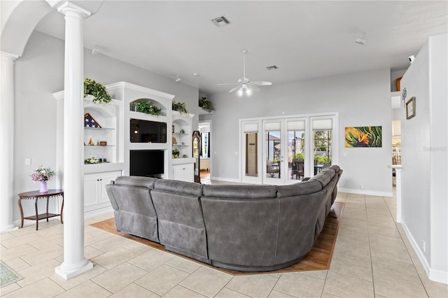 living area with ceiling fan, light tile patterned floors, visible vents, baseboards, and decorative columns