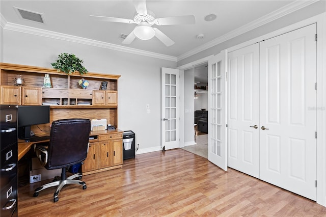 office area with french doors, visible vents, crown molding, and light wood-style flooring