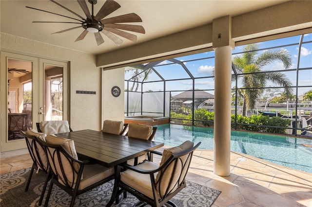 sunroom / solarium featuring a pool, french doors, and ceiling fan