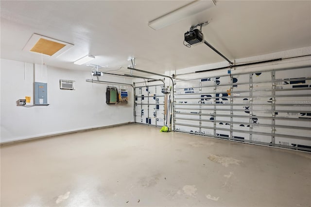 garage with electric panel and a garage door opener