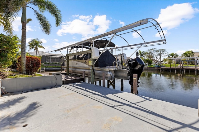 view of dock featuring a water view and boat lift