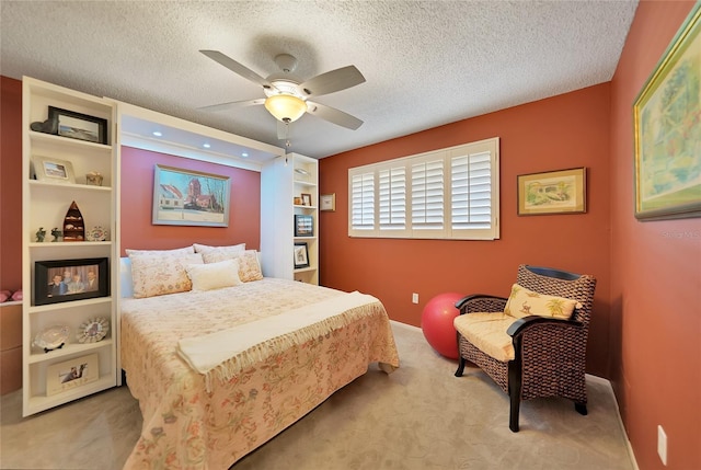 1200 Winward Ct, Punta Gorda, FL 33950 - carpeted bedroom with a textured ceiling and ceiling fan