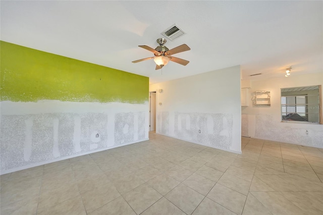 spare room featuring ceiling fan