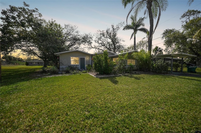 exterior space with a carport