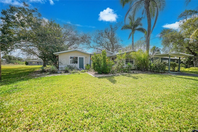 view of yard featuring a carport