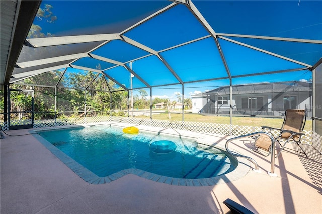 349 Grenada St, Port Charlotte, FL 33948 - view of swimming pool featuring a patio and glass enclosure