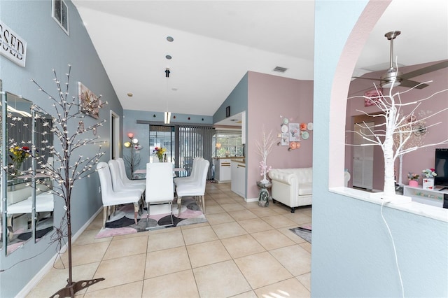 349 Grenada St, Port Charlotte, FL 33948 - tiled dining space featuring ceiling fan and lofted ceiling