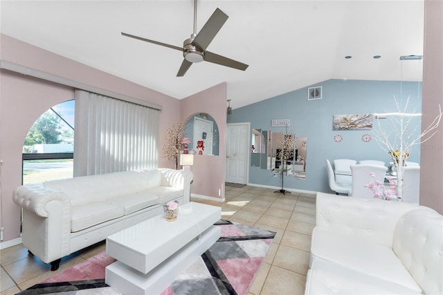 349 Grenada St, Port Charlotte, FL 33948 - living room featuring lofted ceiling, light tile patterned floors, and ceiling fan