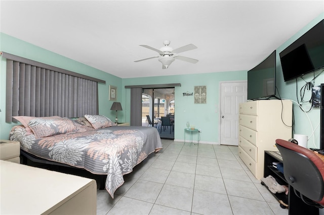 349 Grenada St, Port Charlotte, FL 33948 - tiled bedroom featuring access to exterior and ceiling fan