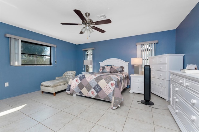 349 Grenada St, Port Charlotte, FL 33948 - bedroom with light tile patterned floors and ceiling fan