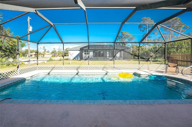 349 Grenada St, Port Charlotte, FL 33948 - view of swimming pool featuring a yard and a lanai