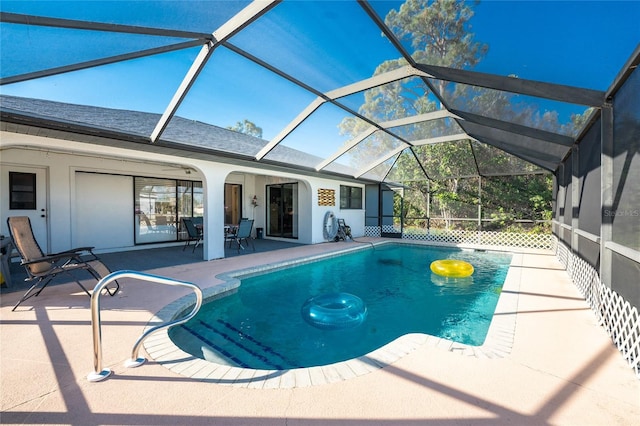 349 Grenada St, Port Charlotte, FL 33948 - view of swimming pool featuring a patio and glass enclosure