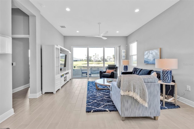 living room featuring ceiling fan