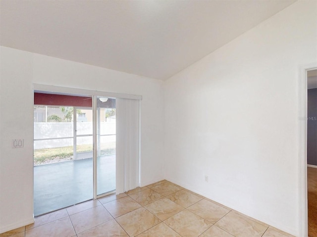 empty room featuring light tile patterned floors