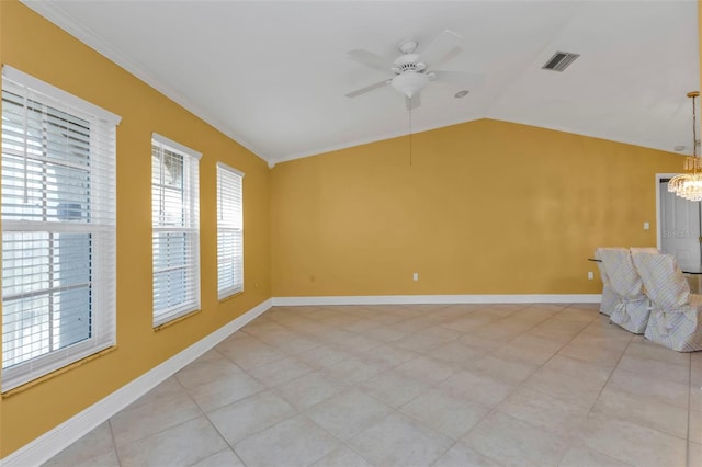 295 Porto Alegre St, Punta Gorda, FL 33983 - empty room with ceiling fan with notable chandelier, a healthy amount of sunlight, crown molding, and vaulted ceiling