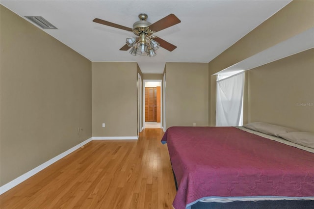 295 Porto Alegre St, Punta Gorda, FL 33983 - unfurnished bedroom with ceiling fan, ensuite bathroom, and light hardwood / wood-style flooring