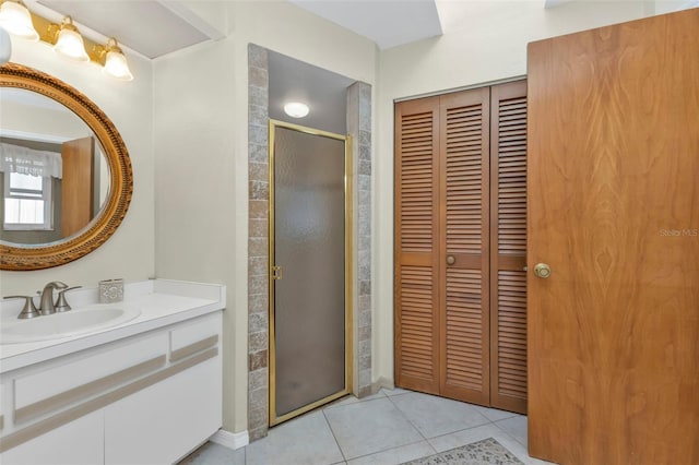 295 Porto Alegre St, Punta Gorda, FL 33983 - bathroom featuring tile patterned flooring, vanity, and walk in shower