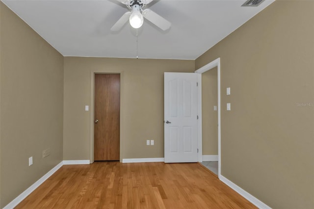 295 Porto Alegre St, Punta Gorda, FL 33983 - spare room featuring ceiling fan and light wood-type flooring
