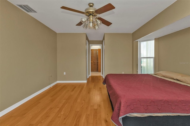 295 Porto Alegre St, Punta Gorda, FL 33983 - bedroom with light hardwood / wood-style floors, ceiling fan, and ensuite bathroom