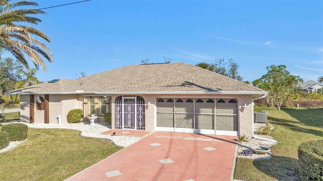 295 Porto Alegre St, Punta Gorda, FL 33983 - single story home featuring cooling unit, a garage, and a front lawn