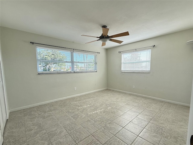 unfurnished room featuring ceiling fan