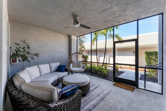 sunroom with a ceiling fan