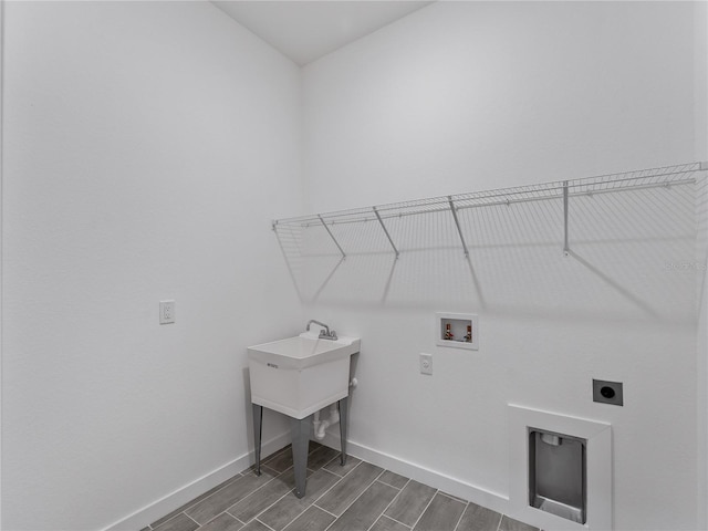 1818 New London St, North Port, FL 34288 - laundry room with electric dryer hookup, washer hookup, and wood tiled floors