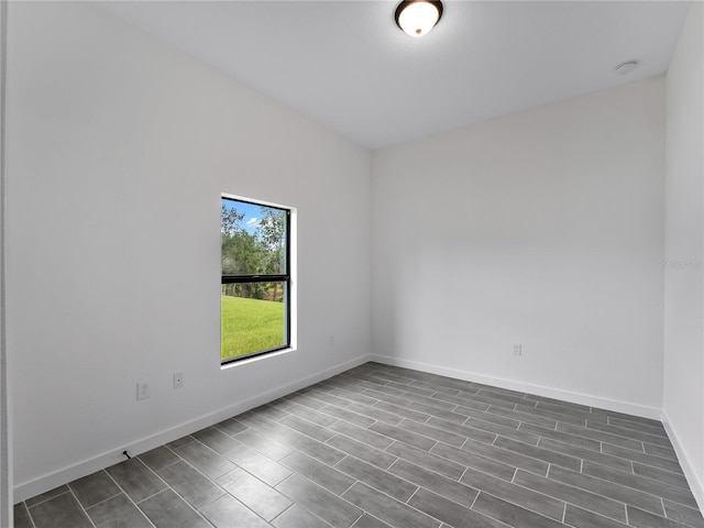 1818 New London St, North Port, FL 34288 - empty room featuring baseboards and a smoke detector