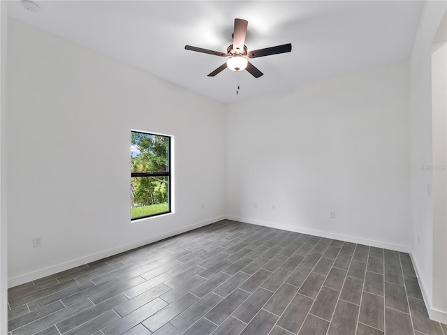 1818 New London St, North Port, FL 34288 - empty room with a ceiling fan, dark wood-style flooring, and a smoke detector