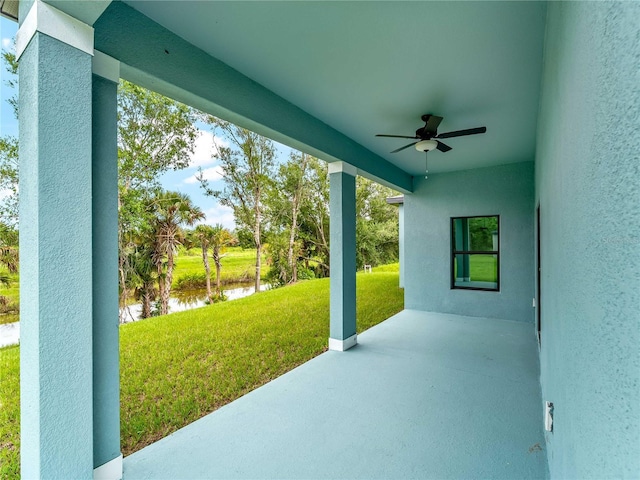 1818 New London St, North Port, FL 34288 - view of patio featuring a ceiling fan and a water view