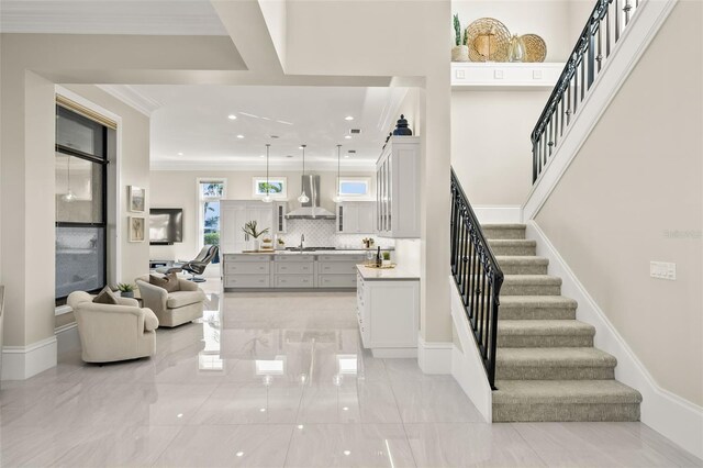 stairs with ornamental molding and sink