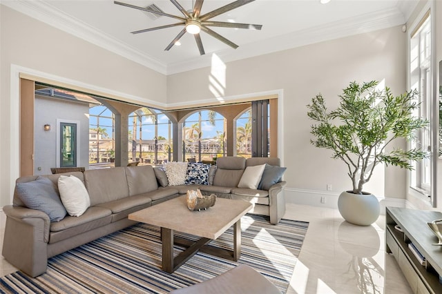 living room featuring crown molding