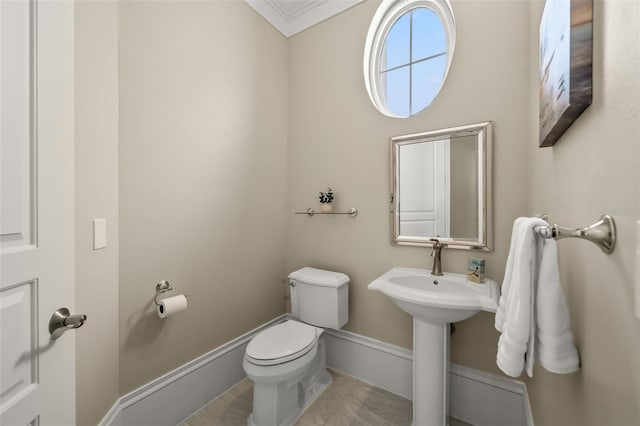 bathroom with tile patterned flooring and toilet