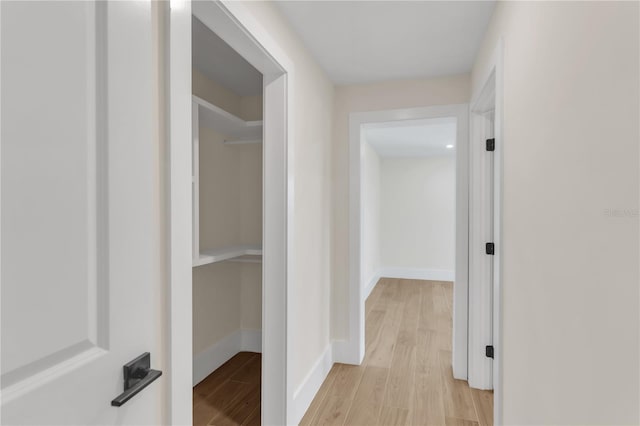 hallway featuring light wood-type flooring